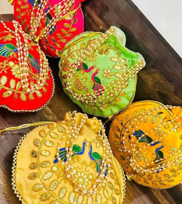 Pecock embroidery with gota patti work potly