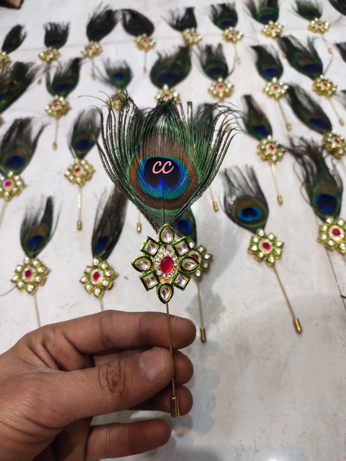 Morpankh lapel pin with peacock feather design for ethnic and wedding wear