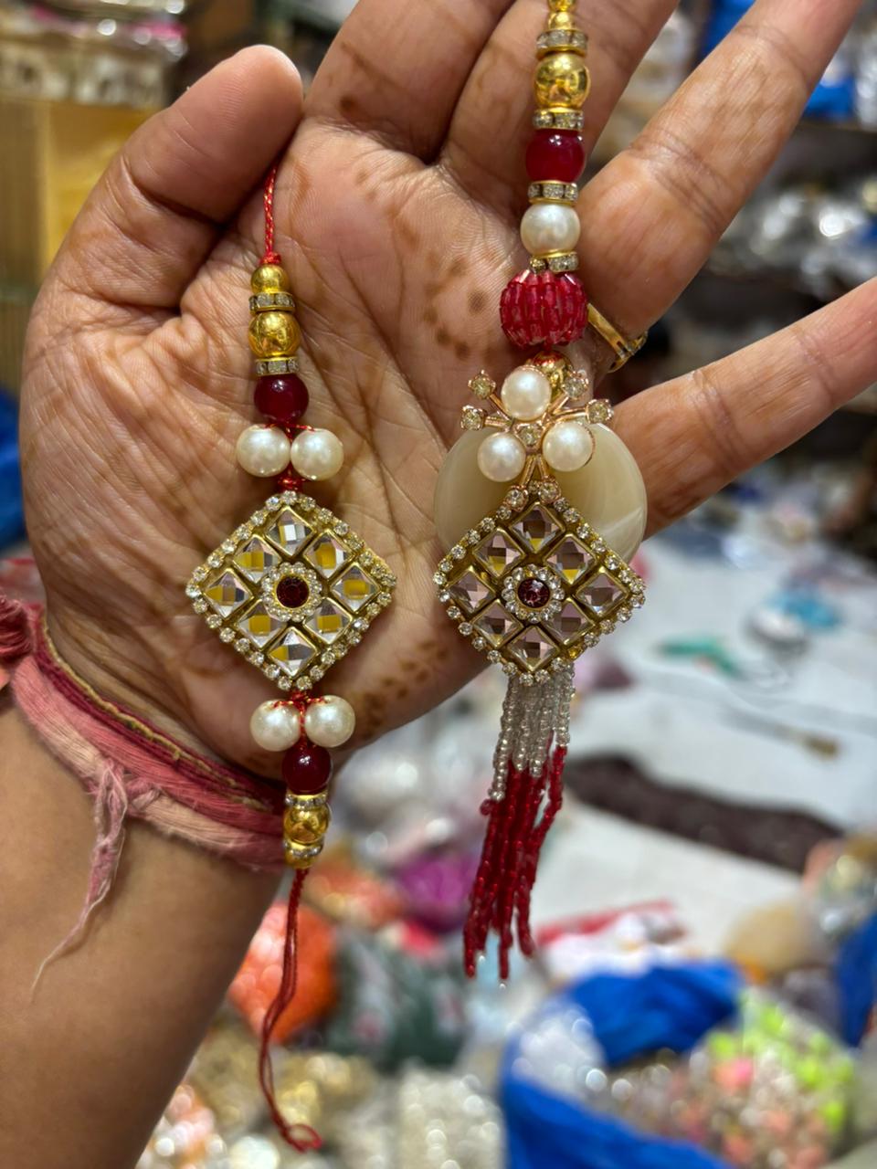 Designer Om Charm Rakhi Bracelet for Raksha Bandhan with spiritual Om symbol and modern thread design