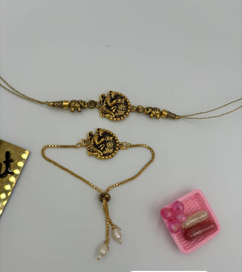 Elegant Gold Finish Jai Shree Ram Rakhi for Brother with traditional thread design