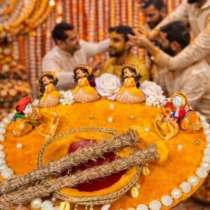 Designer haldi ceremony tray with dolls and traditional floral setup