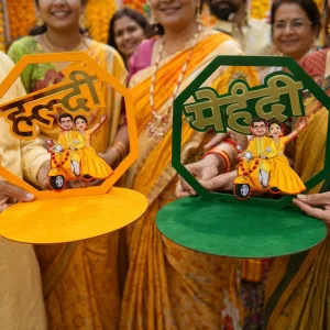 Designer haldi ceremony platter with traditional bride and groom theme decor