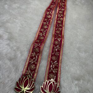 Handmade red lotus design phatka used for bride and groom welcome at Indian wedding
