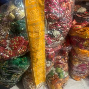 Groom welcome phatka in yellow bandhani design for weddings