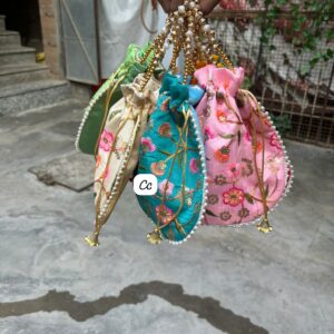 Single side work potli bag with handle used for wedding and festive return gifts
