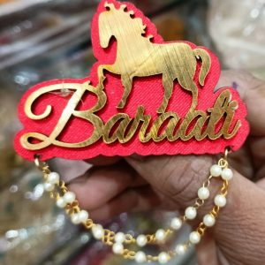 Custom barati name brooch with horse design and pearl chain for Indian wedding