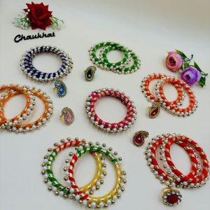 Elegant designer moti kangan ring set with pearl detailing for bridal and festive wear