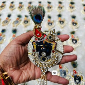 Shrinathji brooch with pearl and kundan work for festive and wedding wear