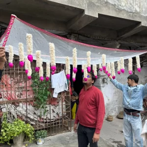 Bridal phoolon ki chadar with jasmine and pink buds for wedding entry ceremony