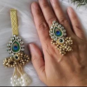 Peacock feather style satka with matching ring for festive return gift