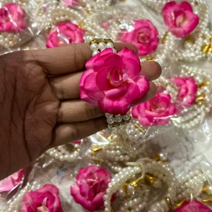 Pearl and flower design bracelet for wedding and festive wear