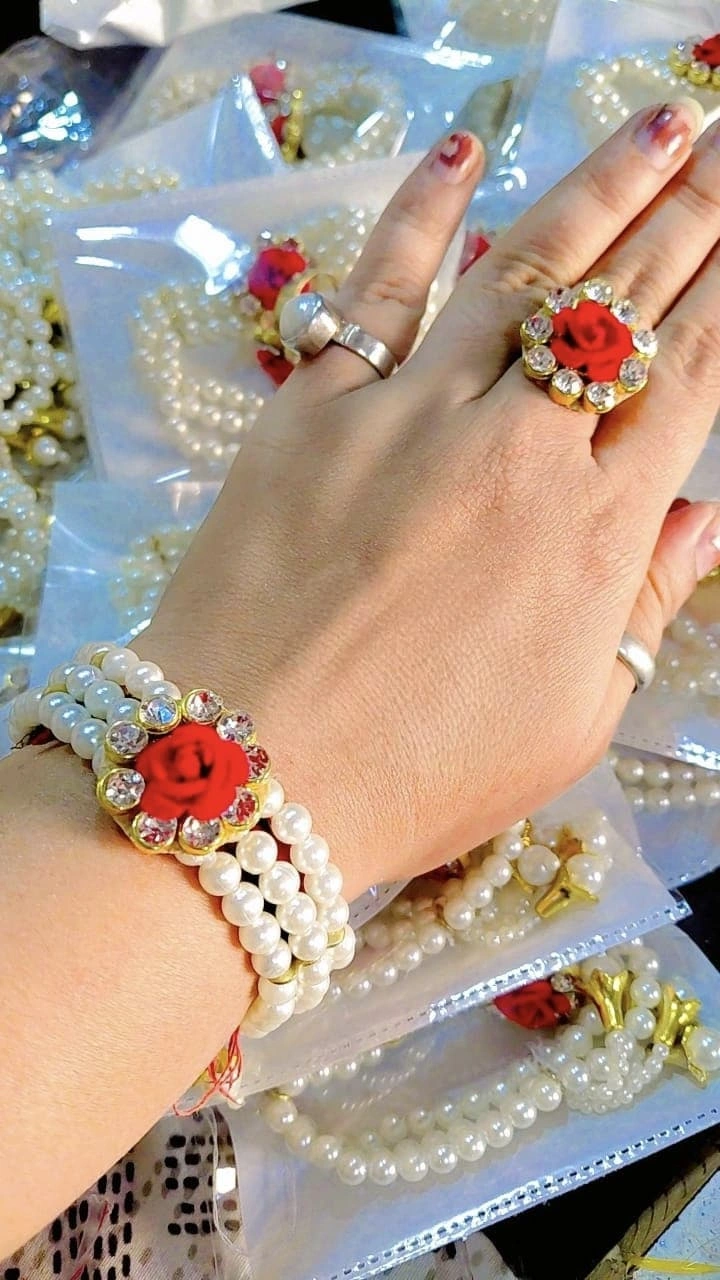Pearl and flower design bracelet and ring combo set for wedding and festive wear