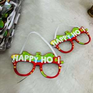 Kids wearing colorful Holi sunglasses with white kurta covered in gulal