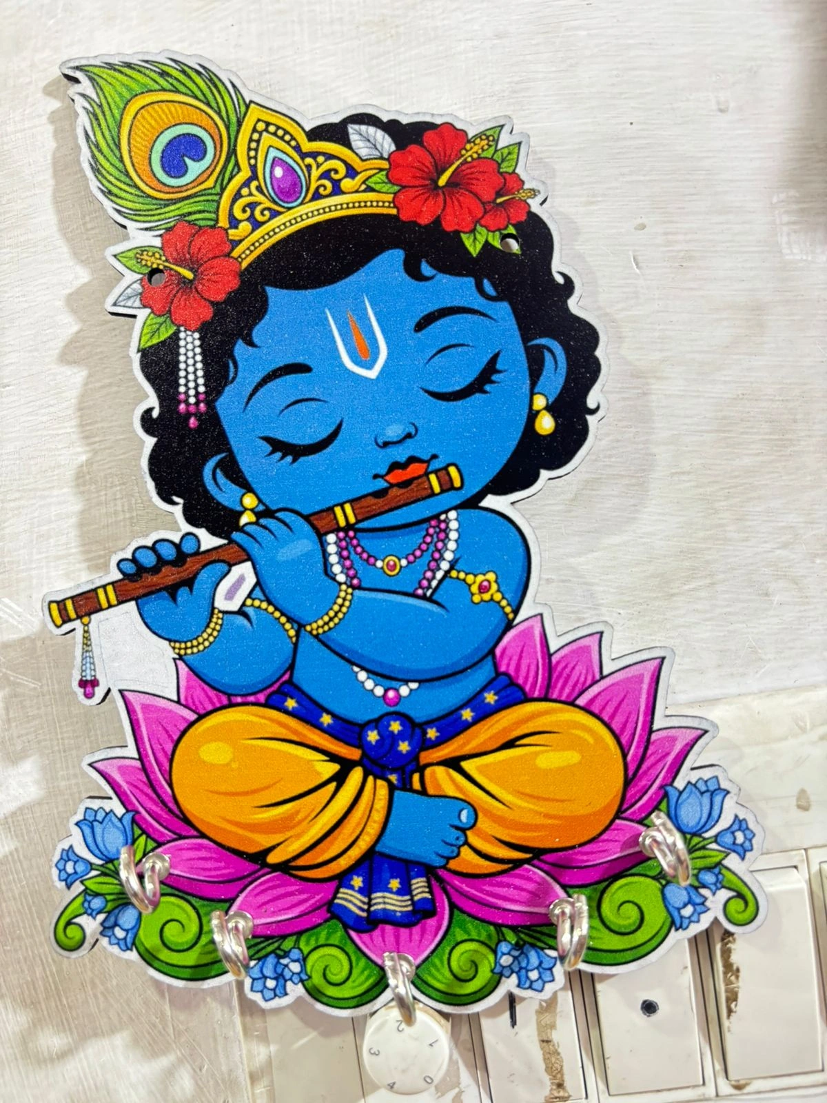 Decorative Krishna wall key holder with hooks for keys