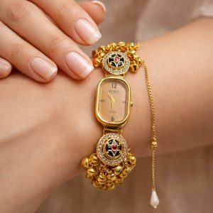 Ethnic golden watch bracelet with decorative stones and ghungroo design for women