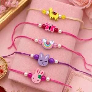 Cute kids rakhi set with colorful cartoon and floral charms for Raksha Bandhan celebration