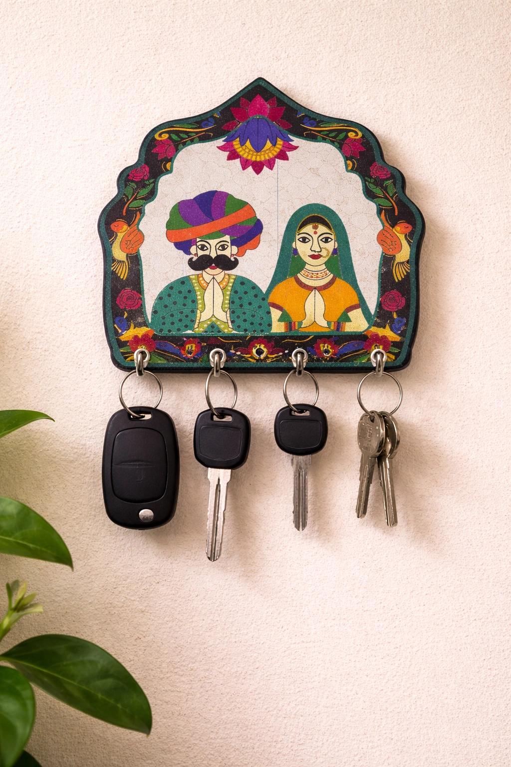 Printed wooden key holder with decorative design and multiple hooks for organizing home and office keys