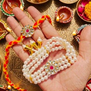Elegant Bhai Bhabhi Rakhi Combo featuring a Kundan Flower Rakhi and Pearl Bracelet Lumba with Roli Chawal for Raksha Bandhan.