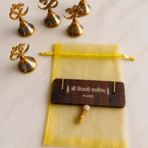 Sawan Shiv Chalisa and Brass Om Bell spiritual gift hamper for Shiva devotees, ideal for return gifts, puja ceremonies and festive gifting.