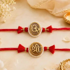 Traditional Om & Shree Premium Red Thread Designer Rakhi for Brother celebrating Raksha Bandhan with elegant religious design.