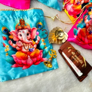Ganesh Chaturthi gift hamper with Ganesh Ji printed potli, brass diya, brass bell and Ganesh Atharvashirsha return gift set for festival celebrations.