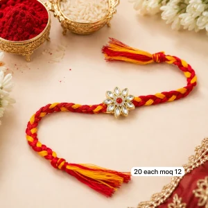 Premium Floral Kundan Rakhi for Brother featuring elegant flower design with sparkling Kundan stones and premium silk thread for Raksha Bandhan.