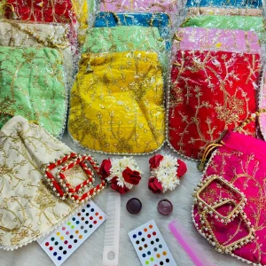 Luxury Teej Shringar Kit for Women with Designer Potli, Bindi, Sindoor, Gajra, Comb and Bangles Pair Festival Gift Hamper