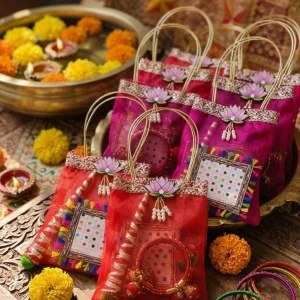 Hariyali Teej Gift Set with Organza Potli Bag, Bangles, Mehndi and Bindi for Women's Traditional Festival Celebration
