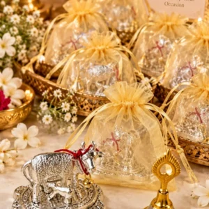 German Silver Cow and Bell in Potli for Diwali and Pooja Gifts