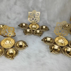 Traditional Ganesh Urli with Diya for pooja room